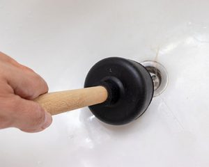 clogged sinks are a sign that you need hydroblasting services